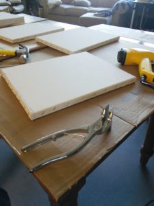 Stretching canvas and all the tools that it requires in this photo by fine artist in training, Julie Dyer Holmes