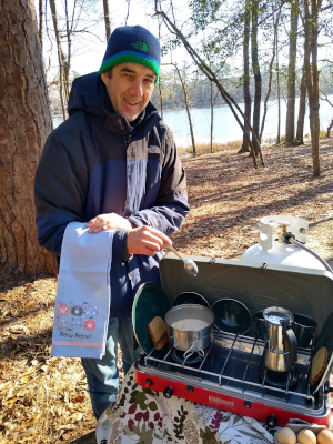 David fixing breakfast outdoors on Saturday Feb 21 2021 It was 28F Brrrrrr